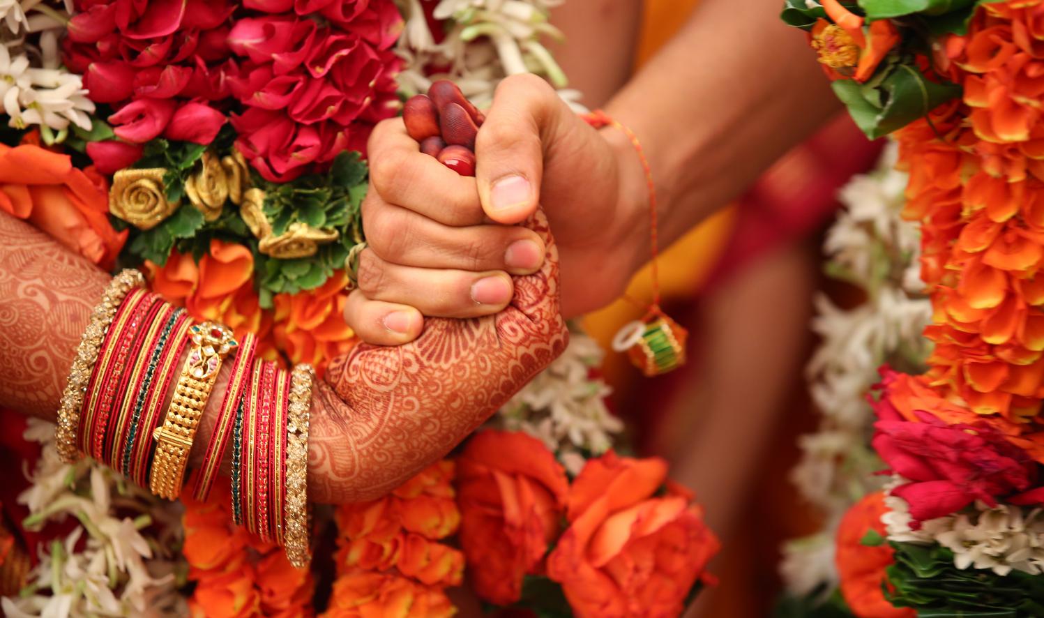 Wedding ritual detail representing the brand's founder-led legacy